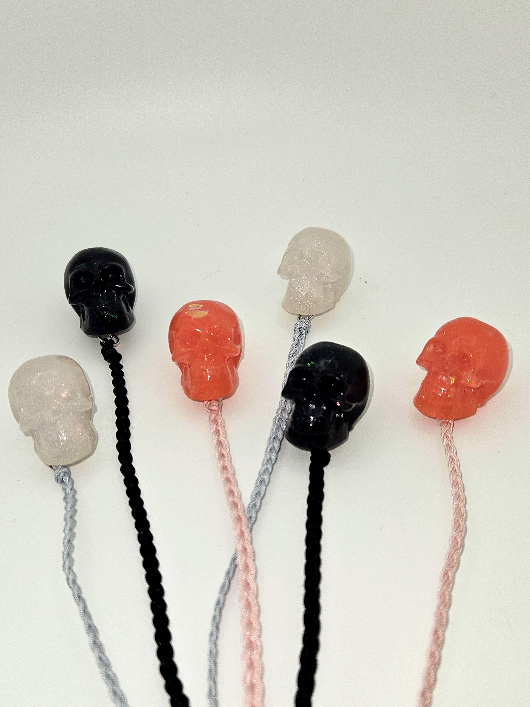 Glow in the dark iridescent skull bookmark